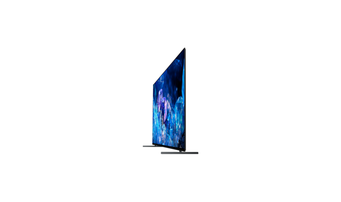 Телевизор BRAVIA A80K с подставкой и изображением синих и фиолетовых кристаллов на экране, вид сбоку