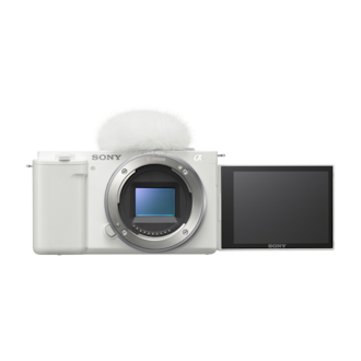 Изображение ZV-E10 в белом цвете с ветрозащитным и откинутым ЖК-экраном.