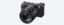 Изображение черной камеры с объективом SEL50F14GM, вид спереди
