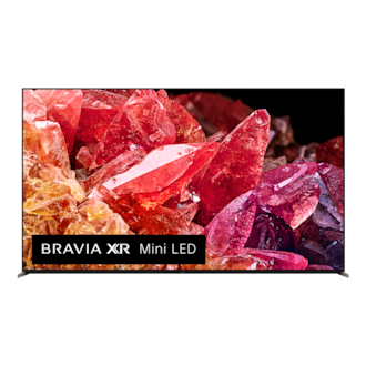 Телевизор BRAVIA X95K с изображением красных и оранжевых кристаллов на экране, вид спереди