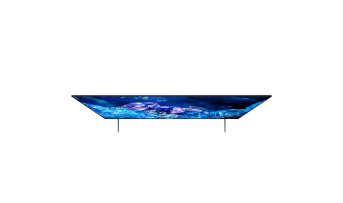 Телевизор BRAVIA A80K с подставкой и изображением синих и фиолетовых кристаллов на экране, вид сверху