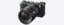 Изображение черной камеры с объективом SEL2070G, вид спереди
