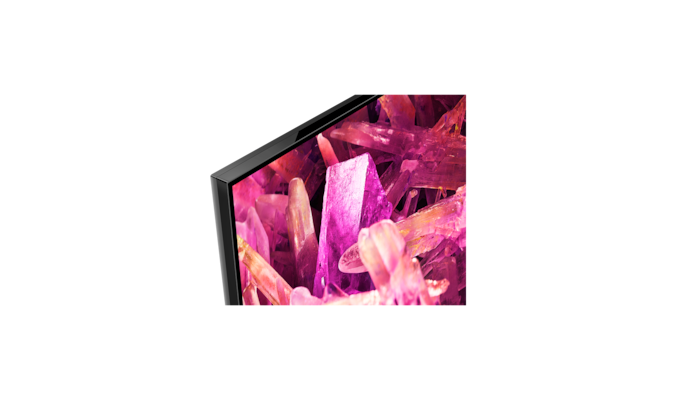 Телевизор BRAVIA X90K с изображением розовых кристаллов на экране, крупный план